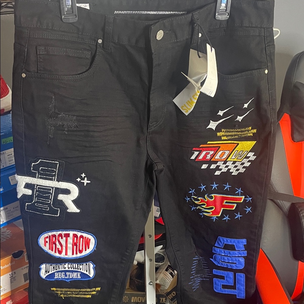 Graphic embroided First row black jeans